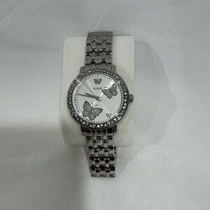 Guess Women's Silver Watch with Butterfly Accents